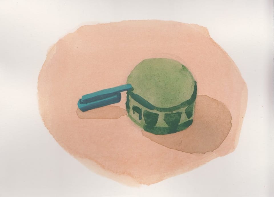 Still Life: Pen Cap and Bottle Cap